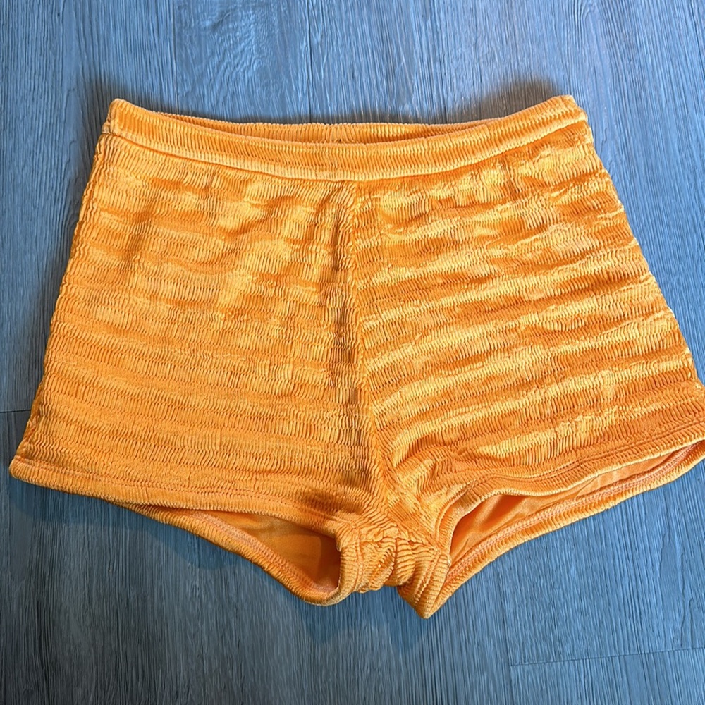 Orange Triangl bathing suit shorts